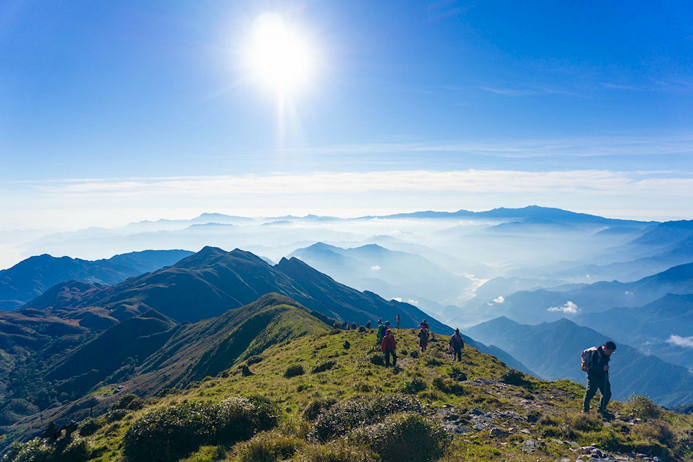 For a truly unforgettable experience, start your climb early in the morning, reaching the summit at sunrise